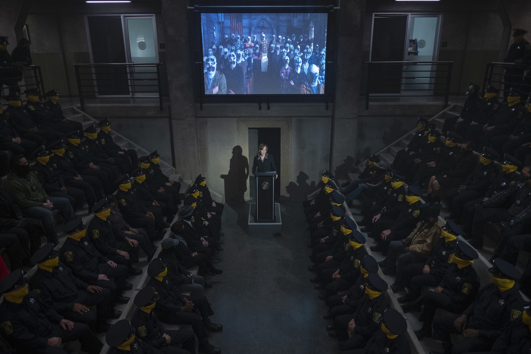 conference room full of masked police officers