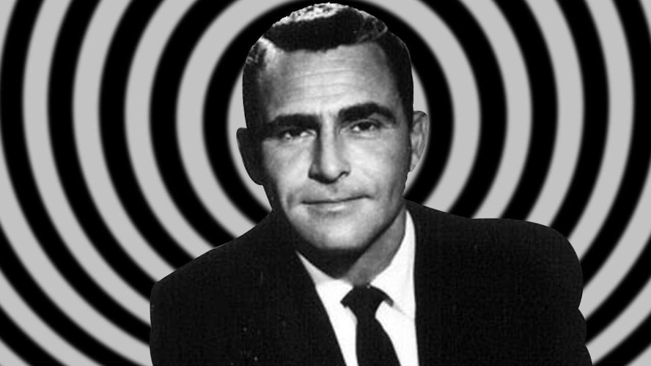 Black and white image of a man in a suit looking at the camera. Behind him is a black and white stripped swirl. It's a clip from the show The Twilight Zone 