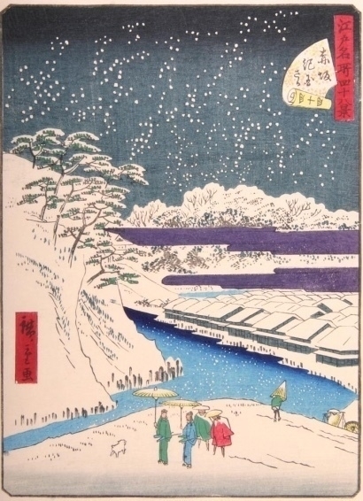 winter scene from the top of a hill looking down on water, rooftops and with people in the foreground.