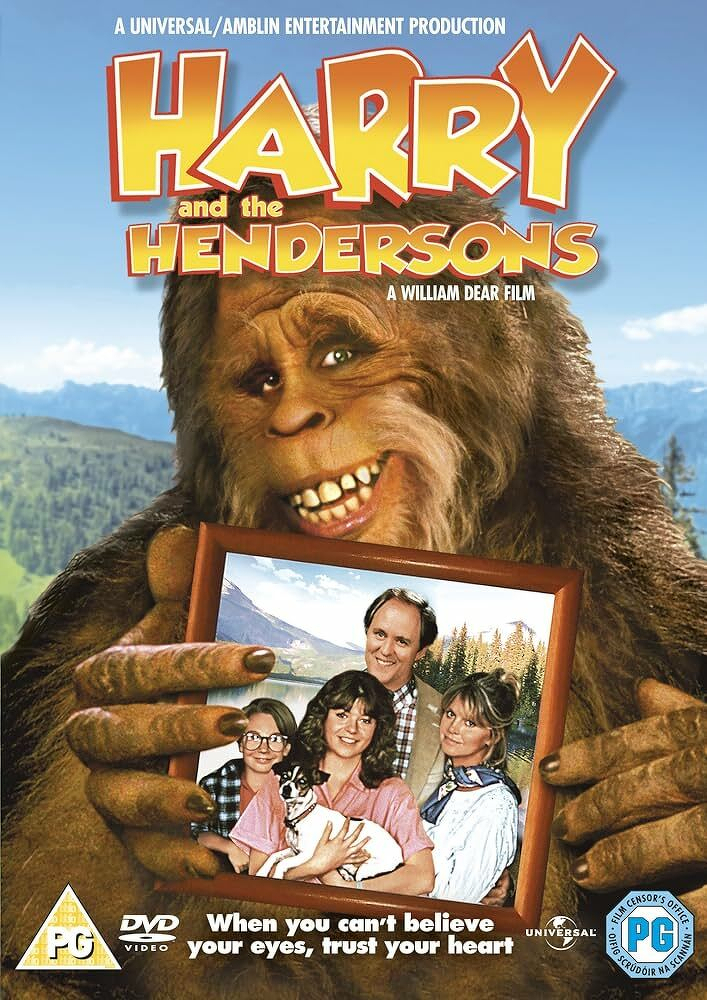 How do I describe this? lol &10;&10;Movie poster. Title in yellow funky font: Harry and the Hendersons. A big foot smiling holding a photo frame with a family in the photo. &10;&10;Bottom: when you can't believe your eyes, trust your heart. 