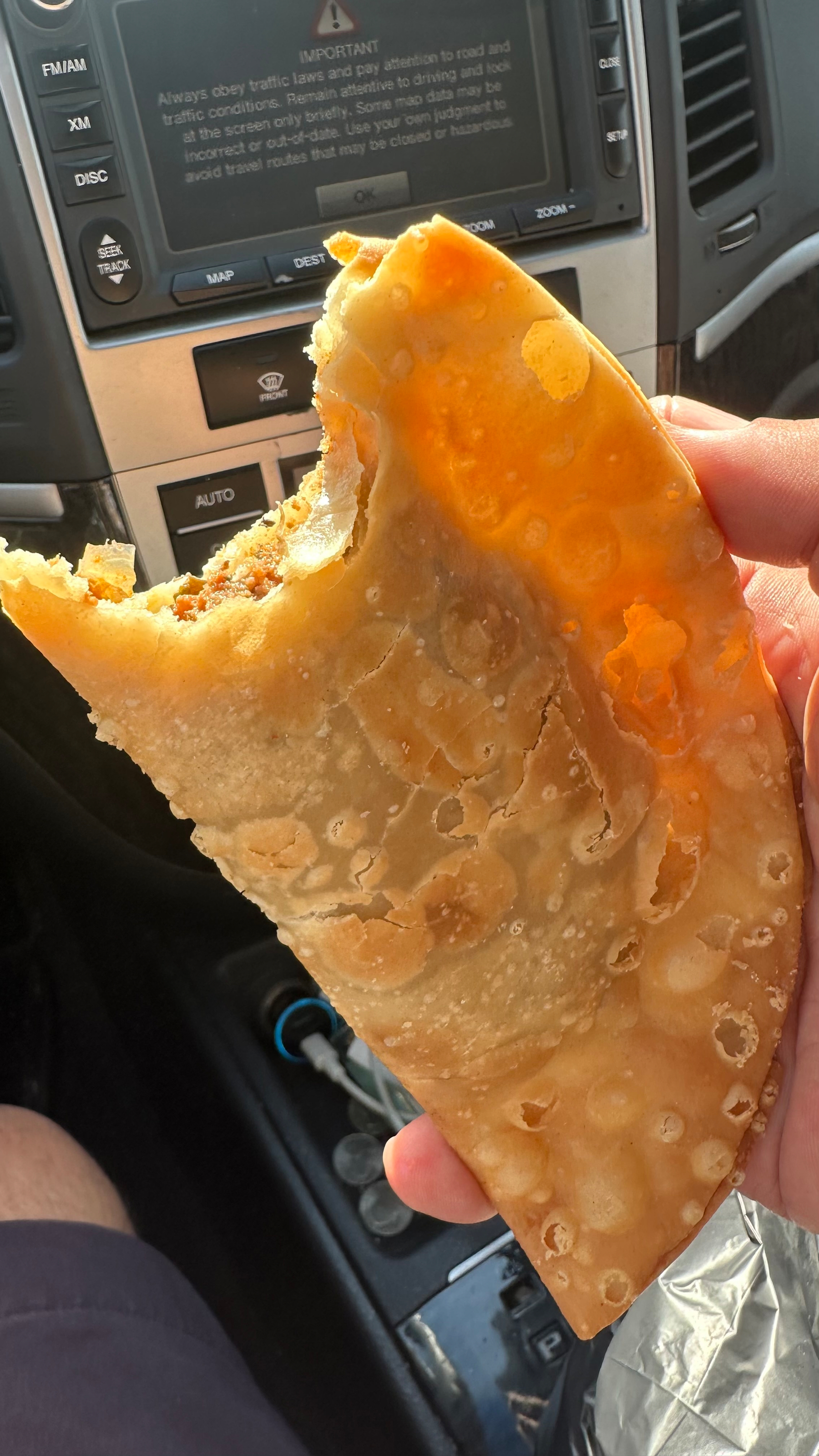 An empanada which is basically a beef patty