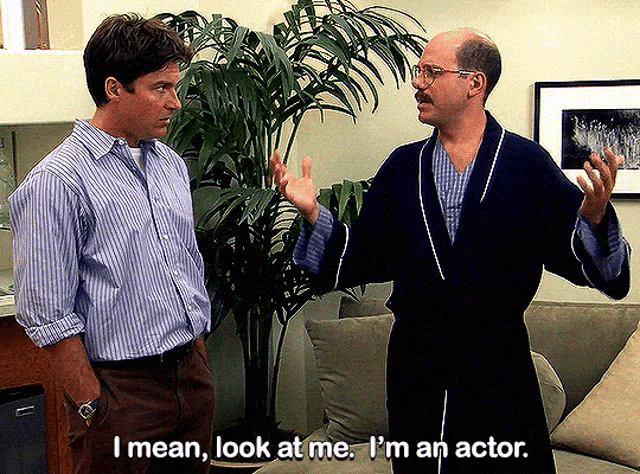 GIF from Arrested Development: Tobias telling Michael "I mean, look at me. I'm an actor. AN ACTOR!"&10;&10;Michael looks down like he's embarrassed. They are both in the McMansion living room. 